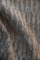 Lustrous simulated silk pile of a Contemporary Pakistani carpet with oxidized silver and powder blue designs.