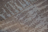 Contemporary Pakistani carpet's soft powder blue and oxidized silver abstract pattern with woven back.
