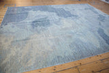 Contemporary Pakistani rug: textured art silk pile, dusty blue, silver, ivory cloud pattern.