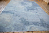Contemporary Pakistani carpet detail, full pile with silver and blue watery pattern, side cord.