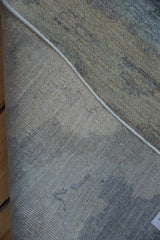 Detail of hand-knotted backing and crisp white side cord selvage.