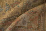 Vintage Indian Soumac rug: reciprocating pawn border, floral vinery in dusty gold, blush, green.