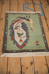 Hand-knotted Armenian rug corner, ivory fringe, and multi-color thin banded border.