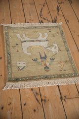 Intact ivory fringe and side cord selvage on a hand-knotted pictorial Armenian rug.