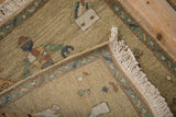 Hand-knotted foundation, white fringe, and floral border of a vintage Armenian rug corner.