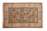 Vintage Armenian Hamadan design rug with an allover floral and boteh pattern on a deep sage field with an ivory border.