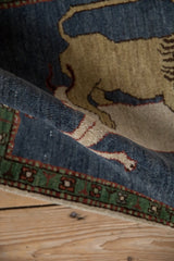 Original full pile and dark denim blue field of the rolled pictorial Armenian rug.