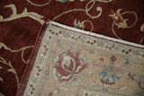 Corner of a vintage Armenian rug showing the detailed hand-knotted back and dense wine red pile.