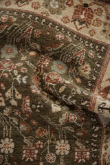 Rich texture of the full, hand-knotted pile on a vintage Armenian rug in olive green and copper tones.