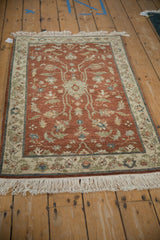 Lush wool pile of a vintage Armenian Lilihan rug with floral vinery on a copper field.