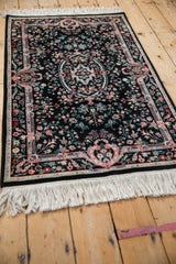 Vintage Pakistani Savonnerie rug's cameo oval medallion and colorful serrated floral field.