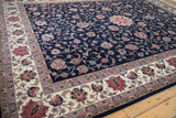 Ivory border of Isfahan design vintage rug with blush palmettes and delicate vinery.