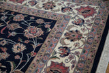 Vintage Pakistani Isfahan carpet corner: navy field, ivory border, delicate floral vinery, fringe.