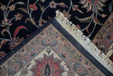 Vintage Pakistani Isfahan carpet corner: navy field, delicate vinery, blush and slate blue border, fringe.
