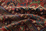 Soft, even hand-knotted pile on the draped Samovar border of a vintage Persian Mahal carpet.