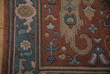 Carved Serapi design detail, highlighting floral palmettes in rose, blue, and beige.