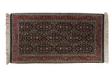 Hand knotted vintage Indian Tabriz design rug runner, black Herati pattern, cherry red Samovar border.