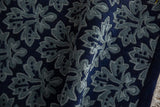 Full, even pile and raised blue leaf design on a vintage hand-knotted Damask style rug.
