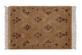 Vintage Indian Savonnerie rug with a carved, tone-on-tone lattice design and trefoil motifs in sand and burgundy.