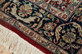 Full wool pile and clean ivory fringe at the corner of an Indian Tabriz design rug.