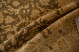 Soft plush wool pile with a high, silk-like luster on a vintage gold wash Oushak rug.