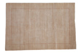 Beige hand knotted Indian Gabbeh carpet featuring open abrashes field with black cherry red checkered seed border.