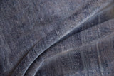 Faux silk pile with modern abstract striations in dusty royal and pale denim blues.