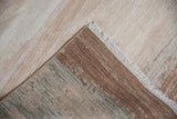 Hand-knotted foundation and fringed edge of the Indian Modern Abstract rug, with ivory pile.