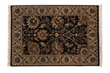 Indian Kashan rug mat, black field, floral palmettes, meandering vine, ivory border.