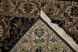Hand-knotted back weave, secured selvage, and ivory fringe of the Indian Kashan rug.