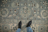 Indian Mahal rug in slate blue with curvilinear floral vines and geometric boteh border.