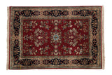 Vintage Indian Sarouk rug mat with burgundy floral medallion, navy cartouche border.