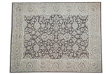 Distressed Agra carpet with dark oxidized silver and dusty ecru allover floral pattern and palmettes.