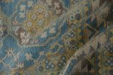 Hand-knotted Pakistani Ersari rug pile with vivid blue, yellow, and ivory snowflake guls.