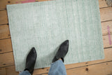 Soft, lustrous pile of the Indian Abstract rug, with sea foam and ivory striations.