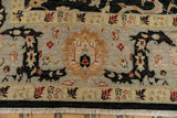 Close-up of the Safavid-style floral border in platinum, silver, and cherry red.