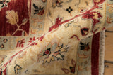 Thick, hand-knotted pile of a Sultanabad design carpet in cherry red and ivory.