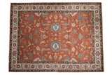 Indian Mahal carpet with large floral cross sections on a copper field, accented with turquoise, ivory and saffron.