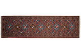 The complete geometric pattern of a vintage Ardebil runner showing its alternating diamond medallions.