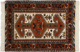 Vintage Indian Northwest Persian rug, rust medallion, ivory field with animal patterns.