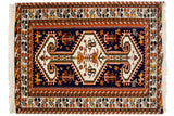Vintage Indian Northwest Persian rug with oversized medallion, abstract animals, navy, rust, and ivory.