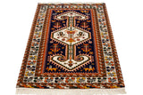 Navy blue field with stylized camel, rust border, and white fringe.
