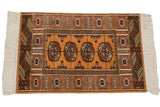 Vintage Indian Bokhara rug showing a plush, even pile and clean, intact white fringe.
