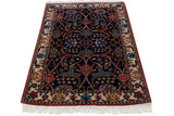 Vintage Indian Bijar design rug with floral arabesques, seen from a high-angle perspective.