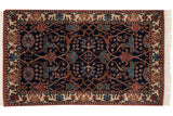 Vintage Indian Bijar rug with a navy field of floral arabesques and a beige palmette border.