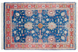 Upper left corner of vintage Bijar rug with terracotta geometric border and sapphire blue palmettes.