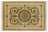 Vintage Indian Savonnerie rug with an embossed roundel medallion and green scrolled arabesques on a cream field.