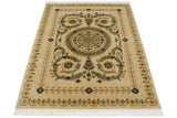 Angled view of a vintage Indian rug highlighting its polished wool pile and embossed contours.