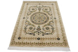 Vintage Indian Savonnerie rug seen from an angle, highlighting the polished, embossed pile.