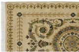 Embossed floral borders and intact side cord on a cream vintage wool rug.